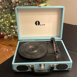 1 by One suitcase-style record player/turntable